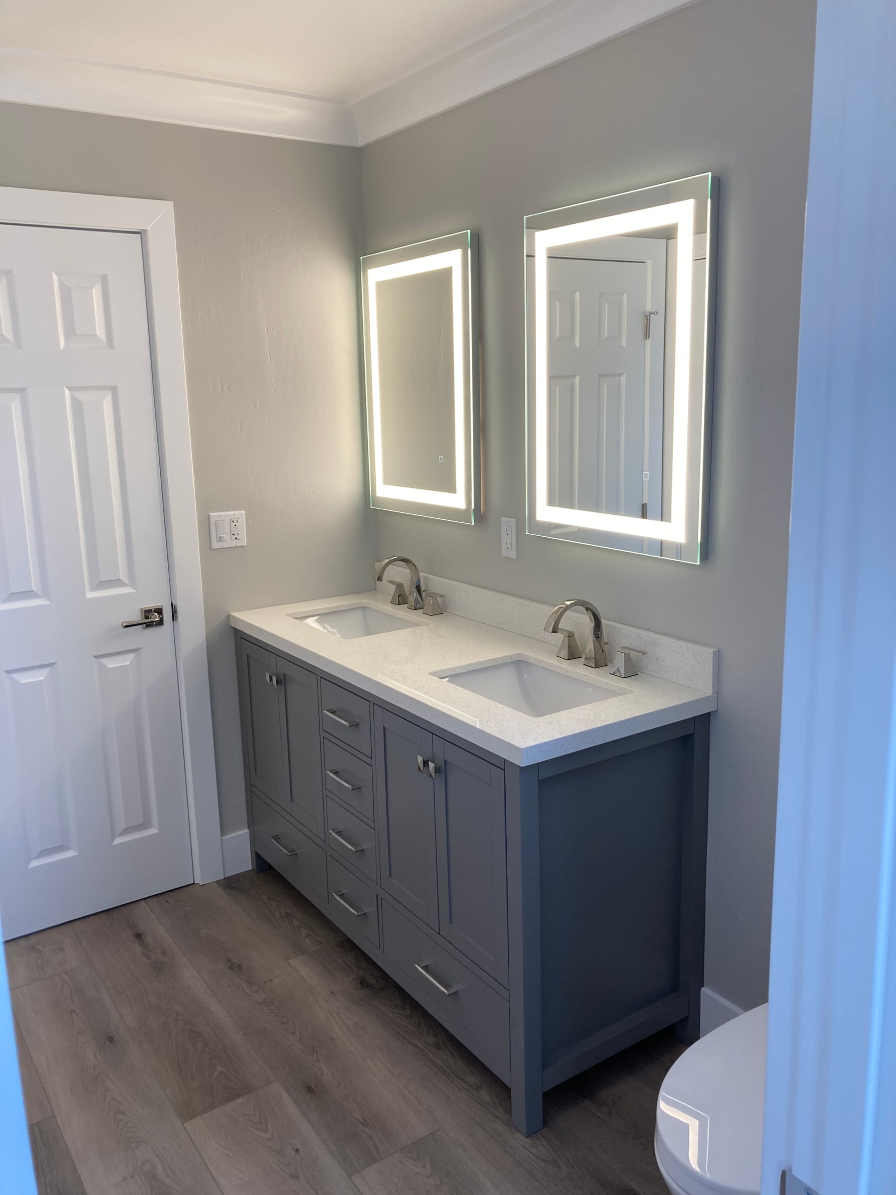 Custom bathroom vanity with coordinated lighting