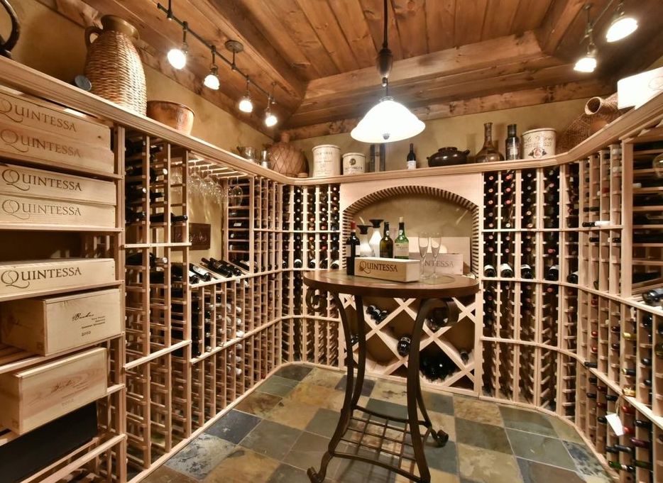 Custom wine cellar with handcrafted wood storage